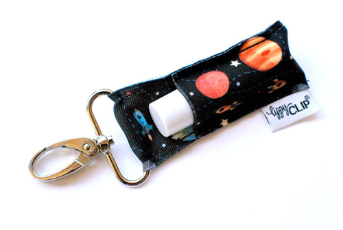 LippyClip: OUT OF THIS WORLD • Clip On Lip Balm Holder • Stocking Stuffer • Backpack Accessories • Keychain Clip-On (4747485970506)